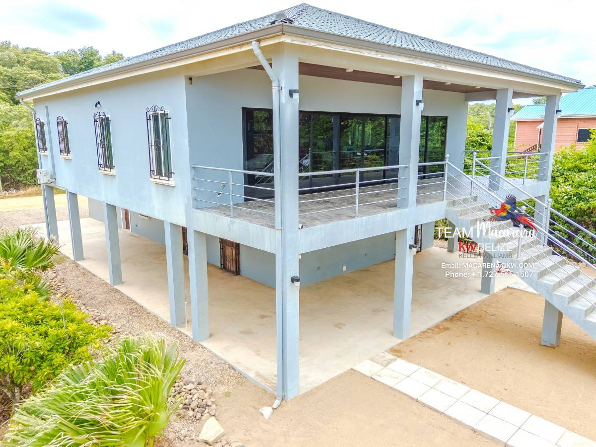 Luxury Belize Beachfront Home with Caribbean Views and Income Potential